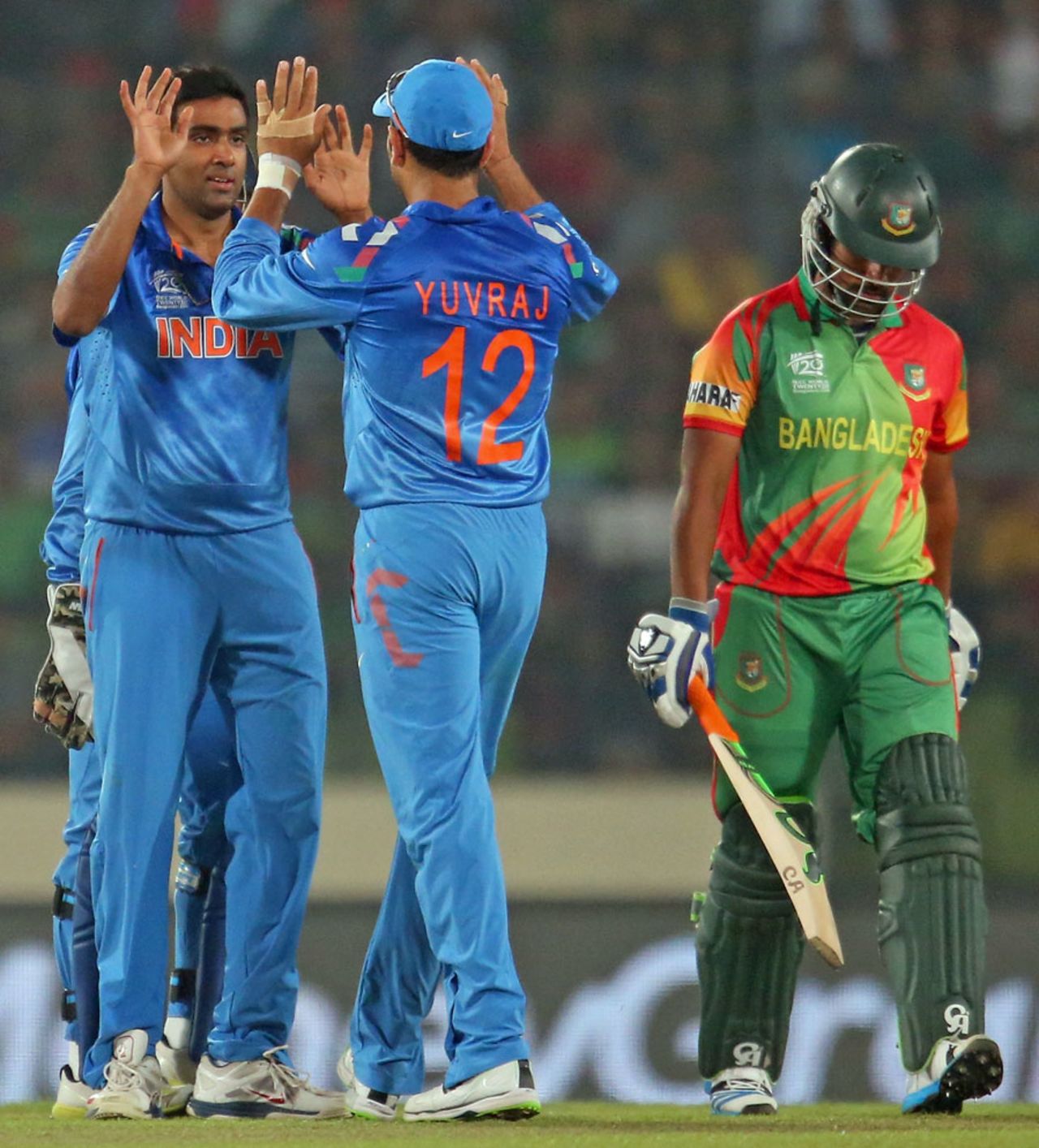 R Ashwin celebrates after dismissing Tamim Iqbal, Bangladesh v India, World T20, Group 2, Mirpur, March 28, 2014