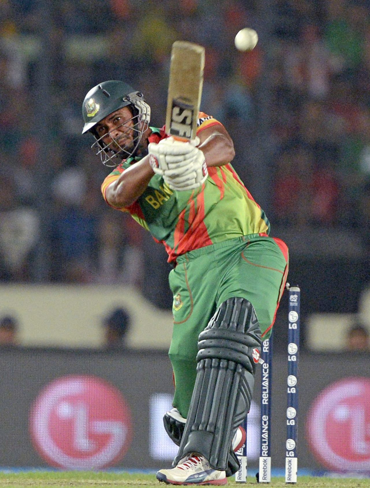 Mahmudullah drills the ball through the leg side, Bangladesh v India, World T20, Group 2, Mirpur, March 28, 2014