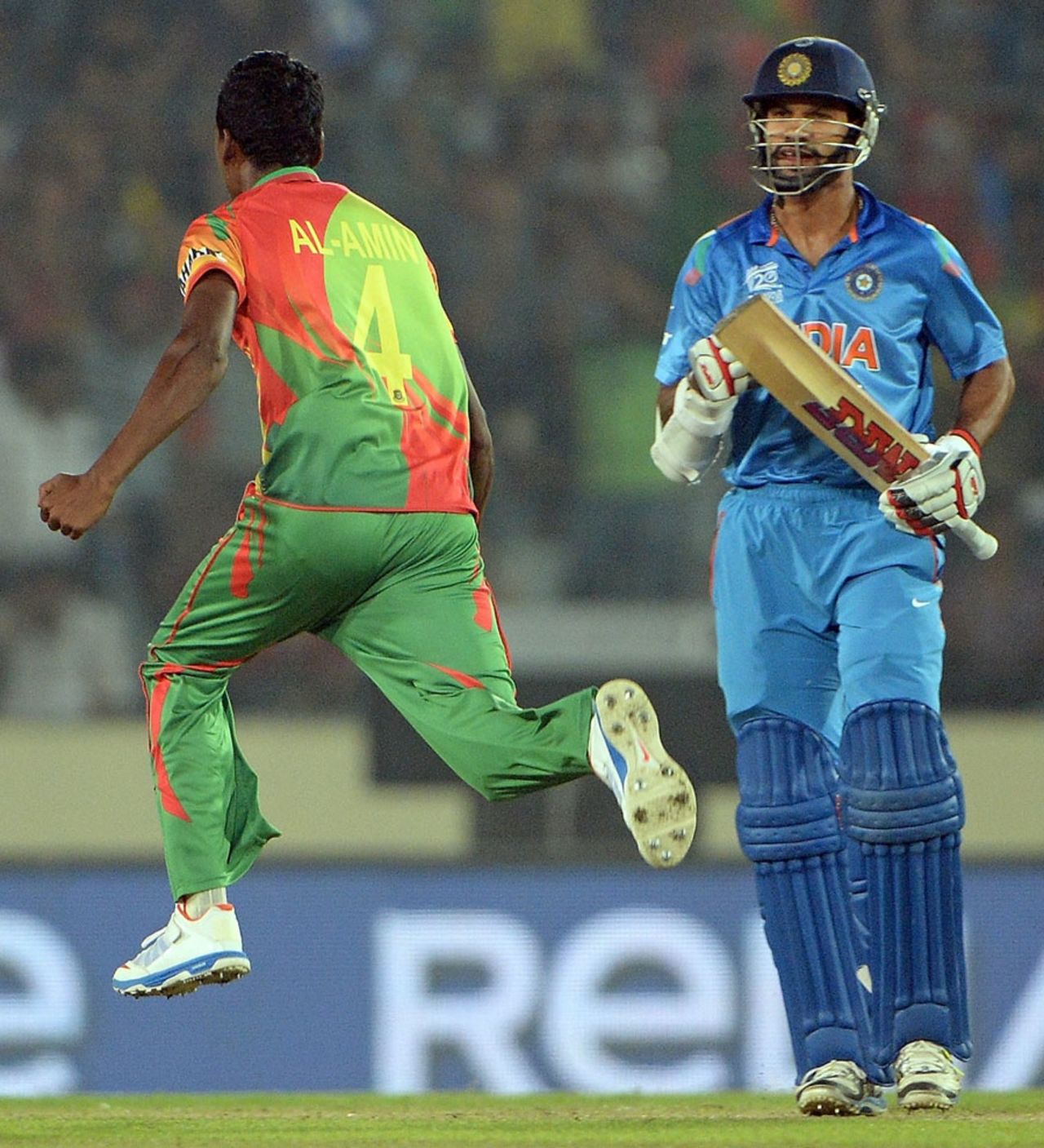 Al-Amin Hossain leaps in joy after dismissing Shikhar Dhawan, Bangladesh v India, World T20, Group 2, Mirpur, March 28, 2014