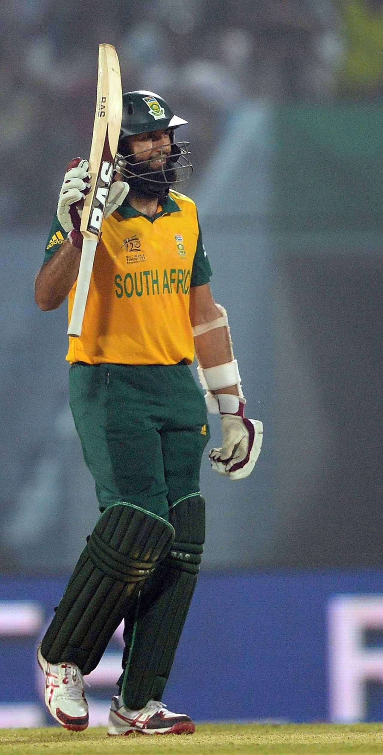 Hashim Amla raises his bat after scoring his maiden T20 fifty, England v South Africa, World Twenty20 2014, Group 1, Chittagong, March 29, 2014