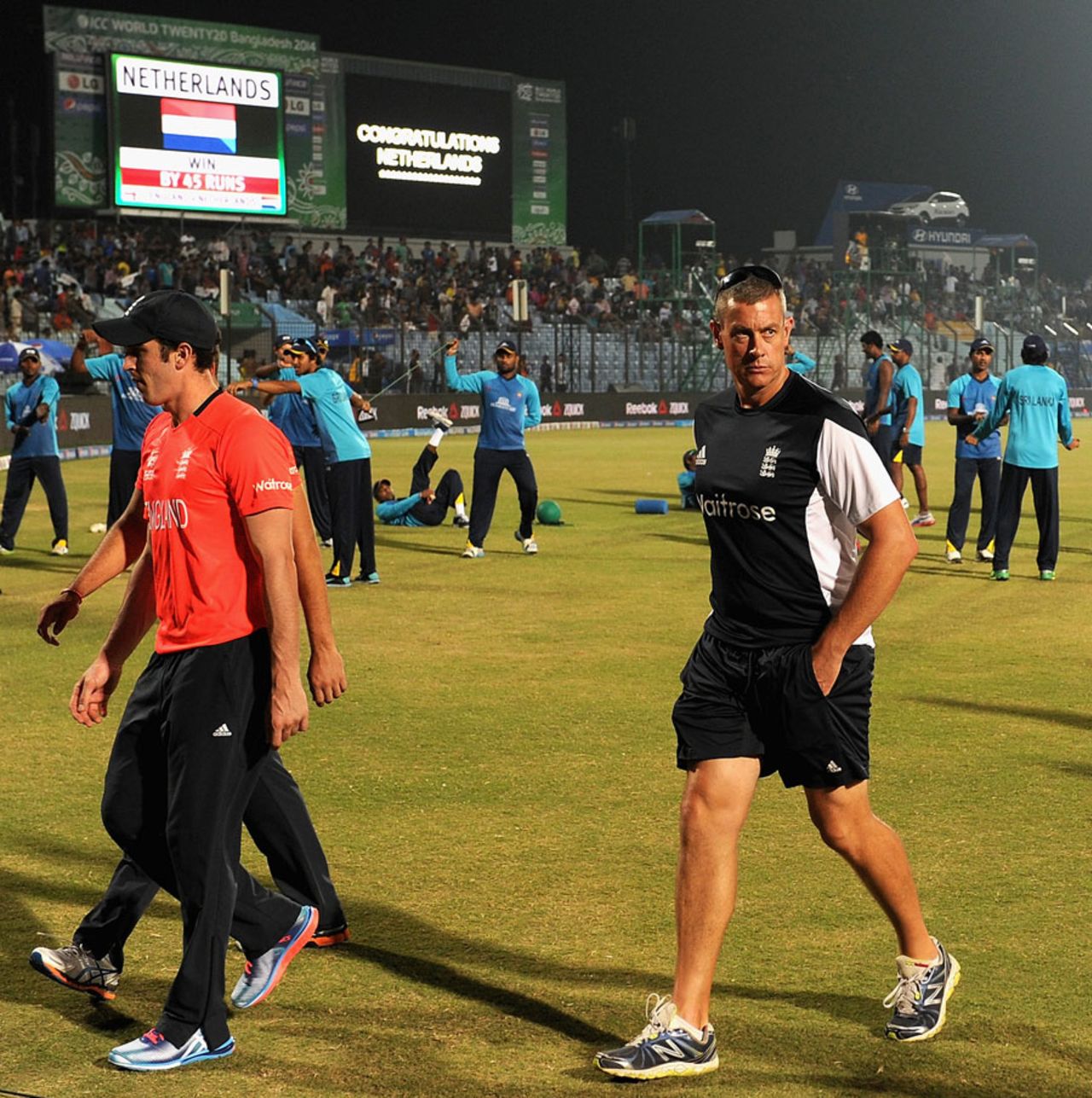Ashley Giles slinks away from England's shambolic defeat, England v Netherlands, World T20, Group 1, Chittagong, March 31, 2014