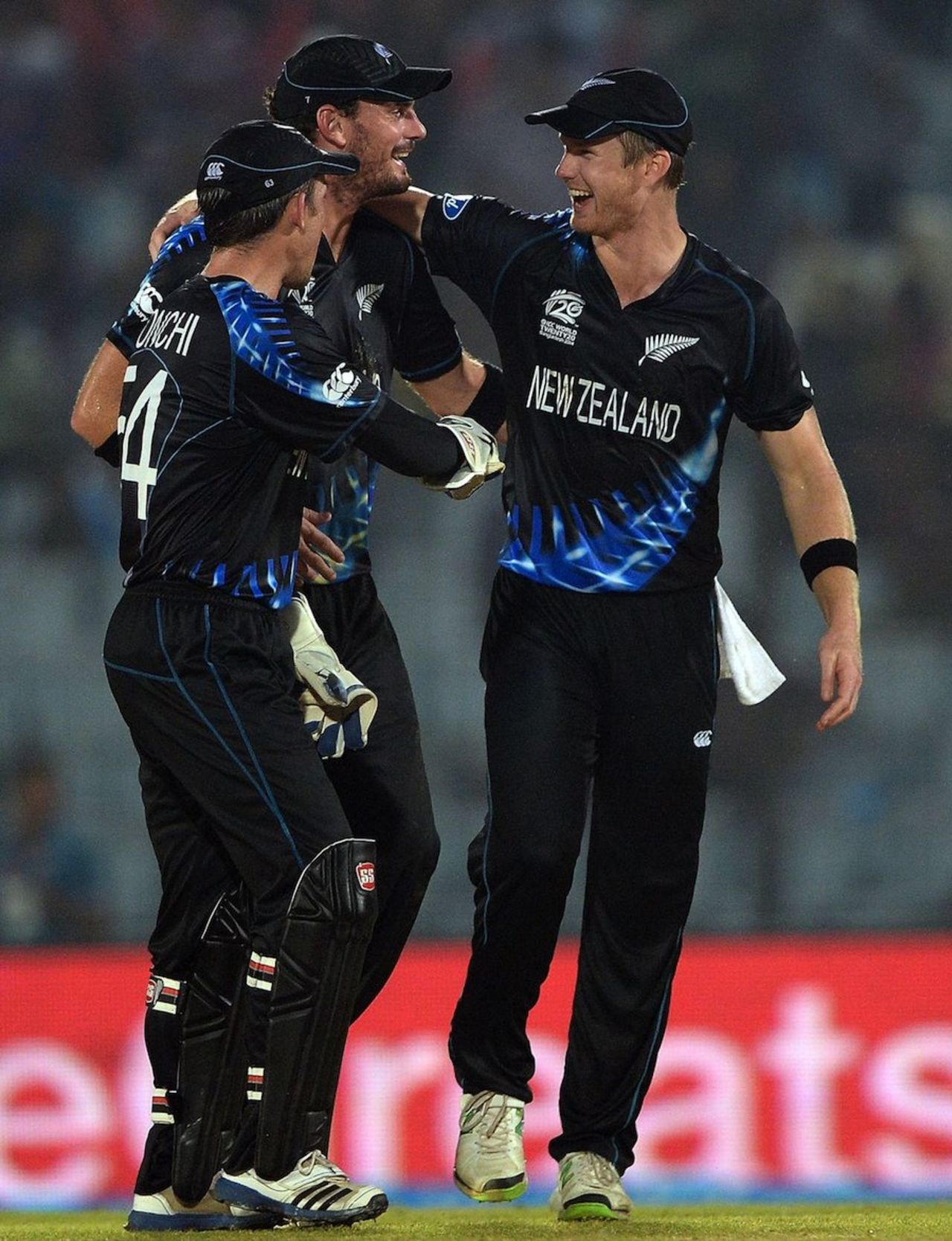 Jimmy Neesham, Kyle Mills and Luke Ronchi celebrate a wicket, New Zealand v Sri Lanka, World T20, Group 1, Chittagong, March 31, 2014