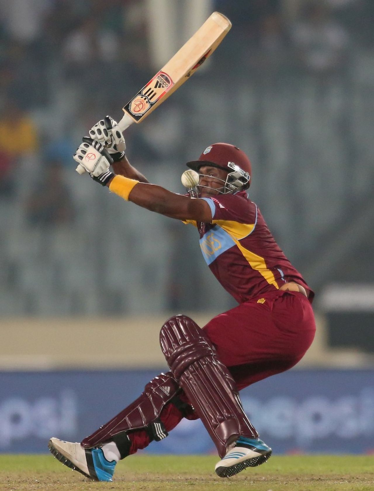 Dwayne Bravo attempts to hit the ball, Pakistan v West Indies, World T20, Group 2, Mirpur, April 1, 2014