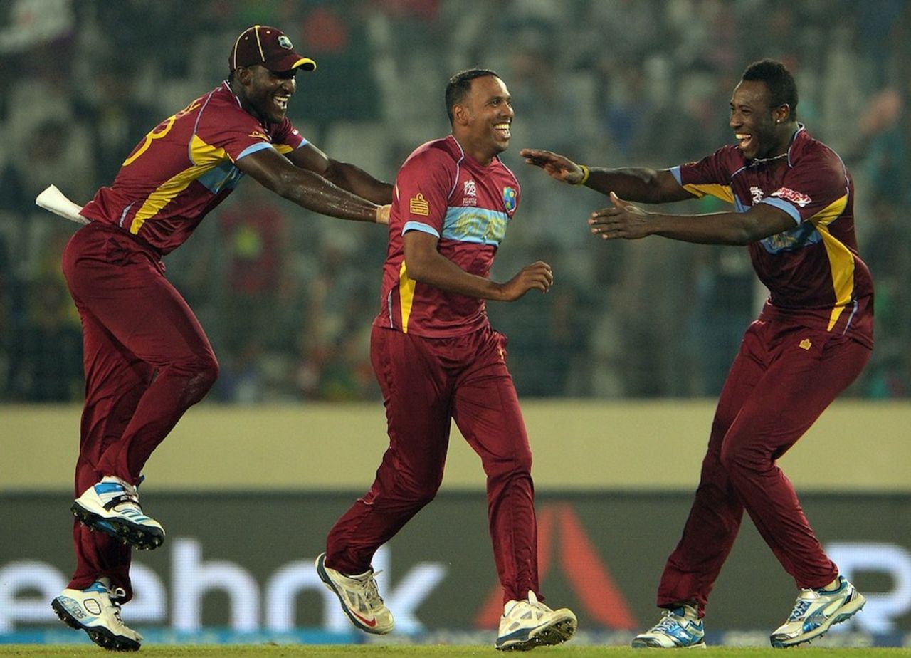 Darren Sammy and Andre Russell congratulate Samuel Badree, Pakistan v West Indies, World T20, Group 2, Mirpur, April 1, 2014