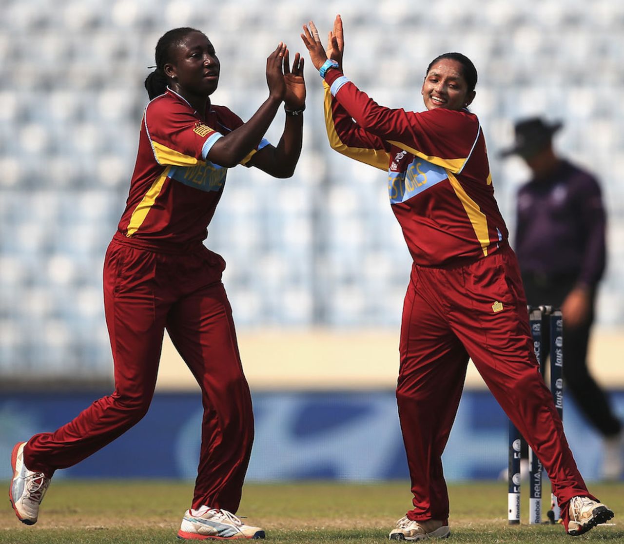 Stafanie Taylor and Anisa Mohammed celebrate the fall of Elyse Villani, Australia v West Indies, Women's World T20, 1st semi-final, Mirpur, April 3, 2014