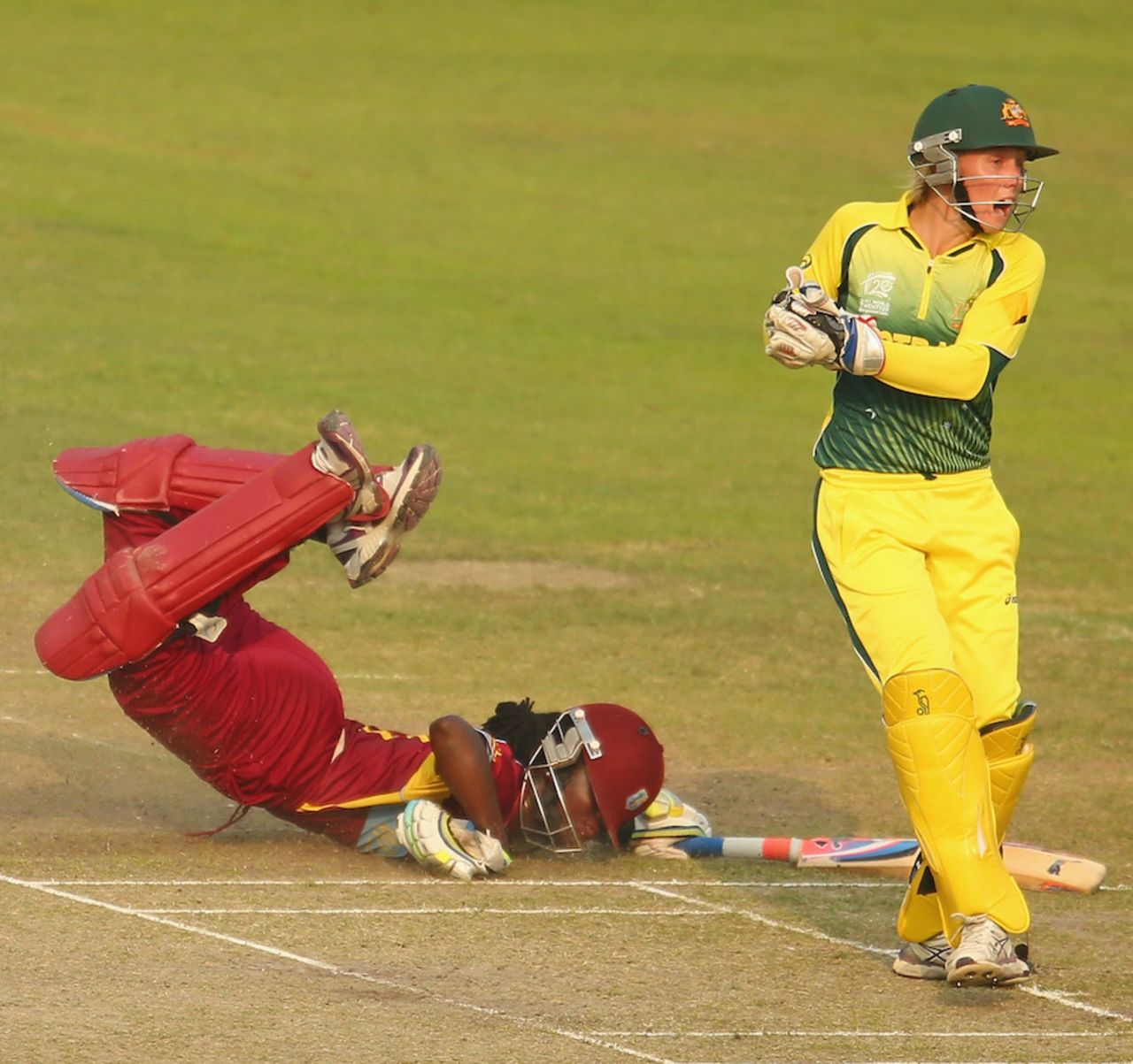 Stafanie Taylor dives but fails to beat a throw to be run-out, Australia v West Indies, Women's World T20, 1st semi-final, Mirpur, April 3, 2014