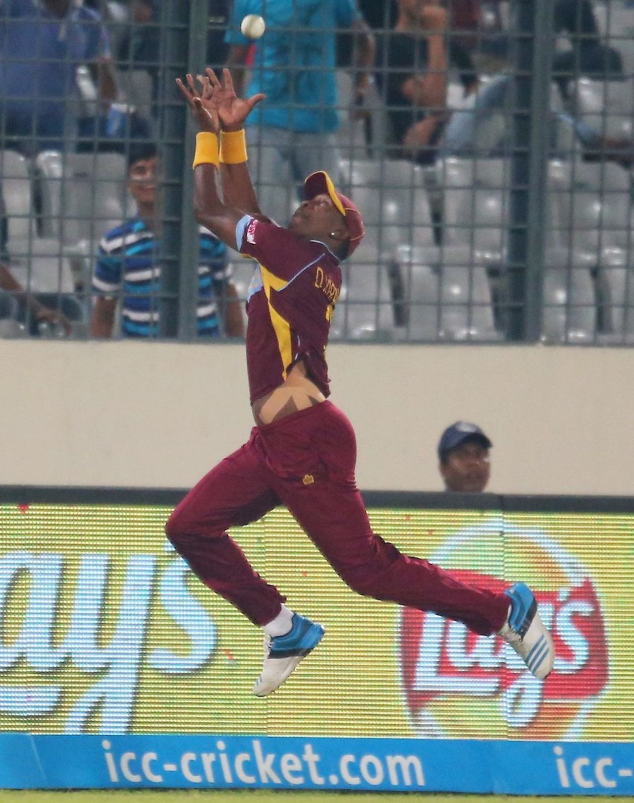 Dwayne Bravo prevents a six, Sri Lanka v West Indies, World T20, semi-final, Mirpur, April 3, 2014