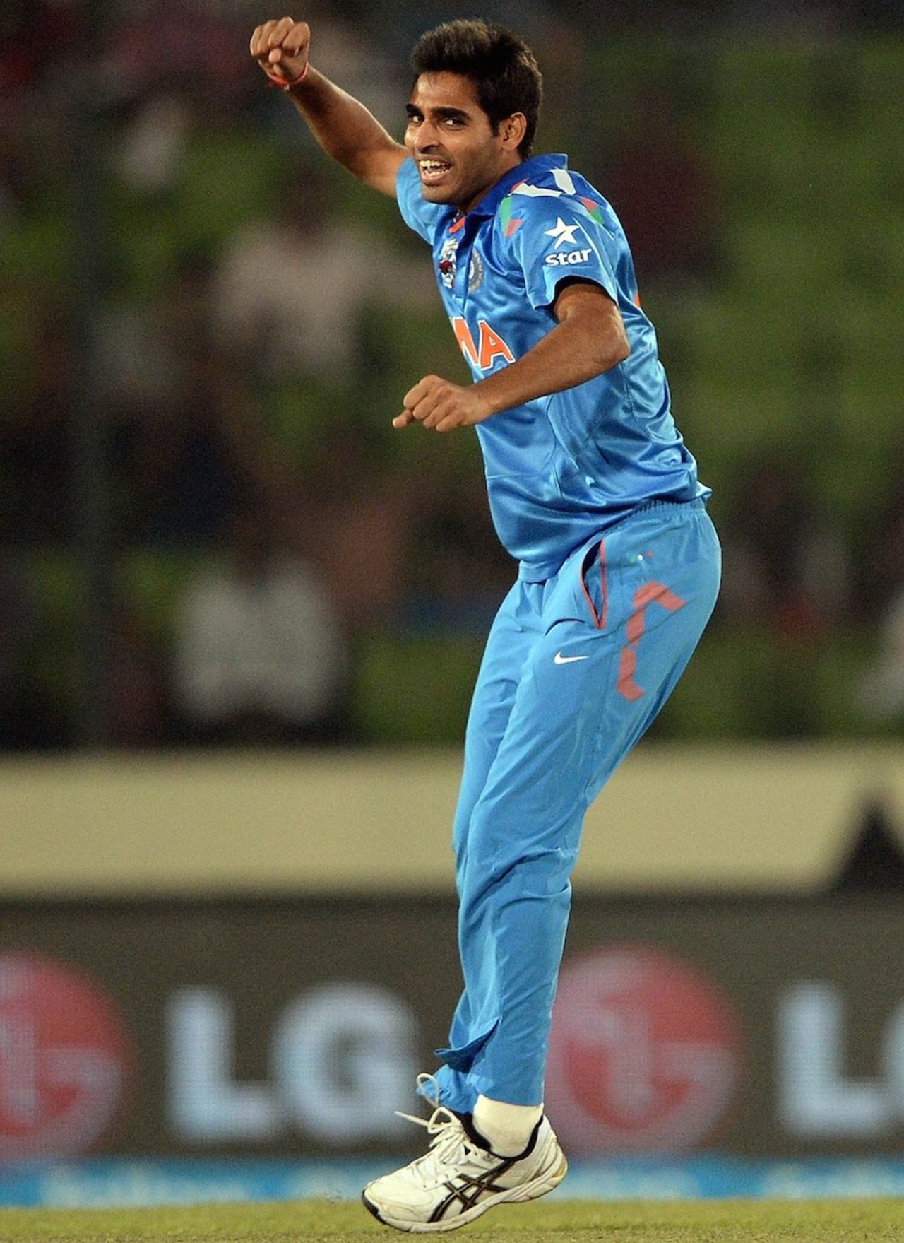 Bhuvneshwar Kumar celebrates the wicket of Quinton de Kock, India v South Africa, World T20, semi-final, Mirpur, April 4, 2014
