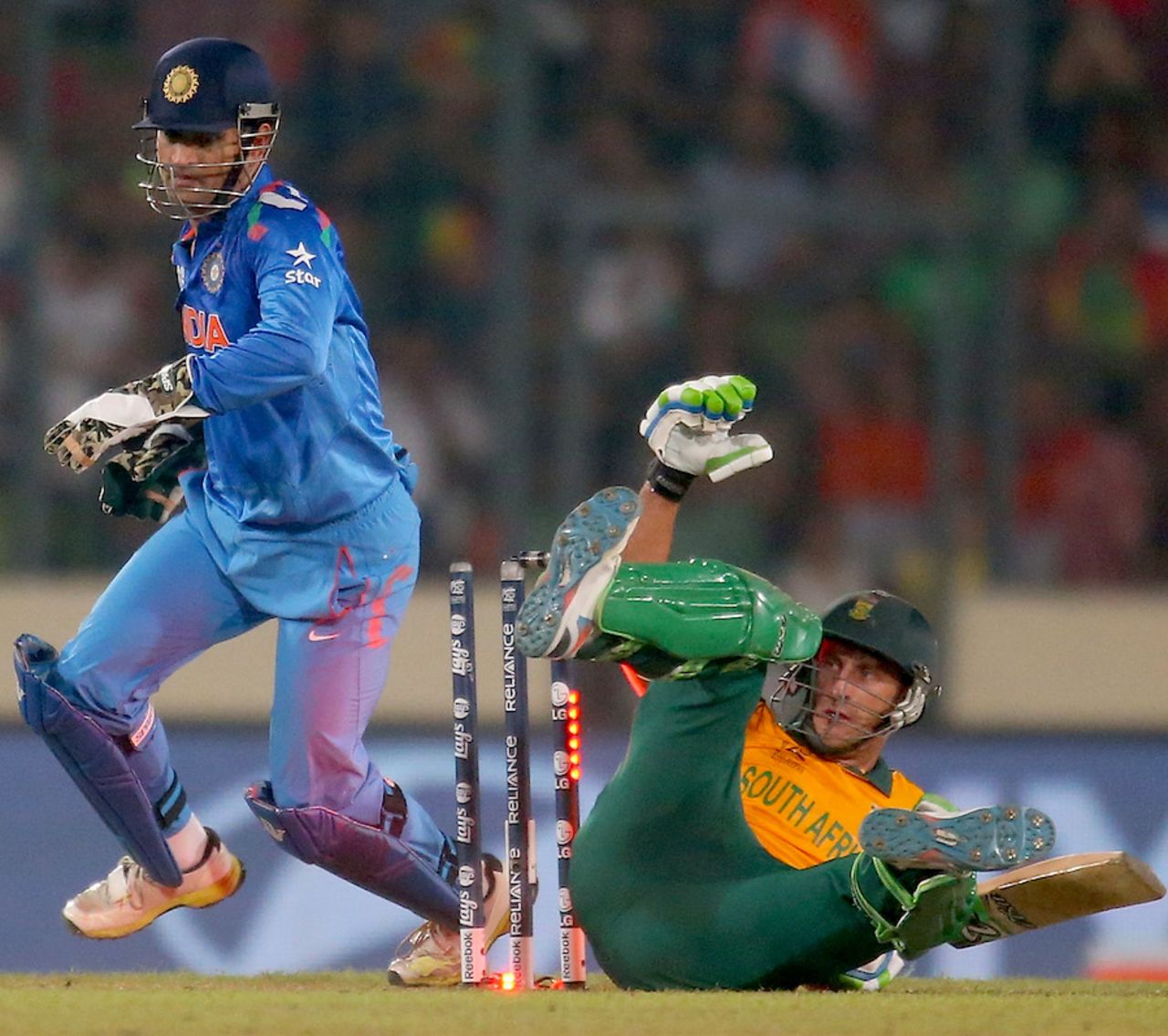 Faf du Plessis gets into a tangle and is bowled, India v South Africa, World T20, semi-final, Mirpur, April 4, 2014