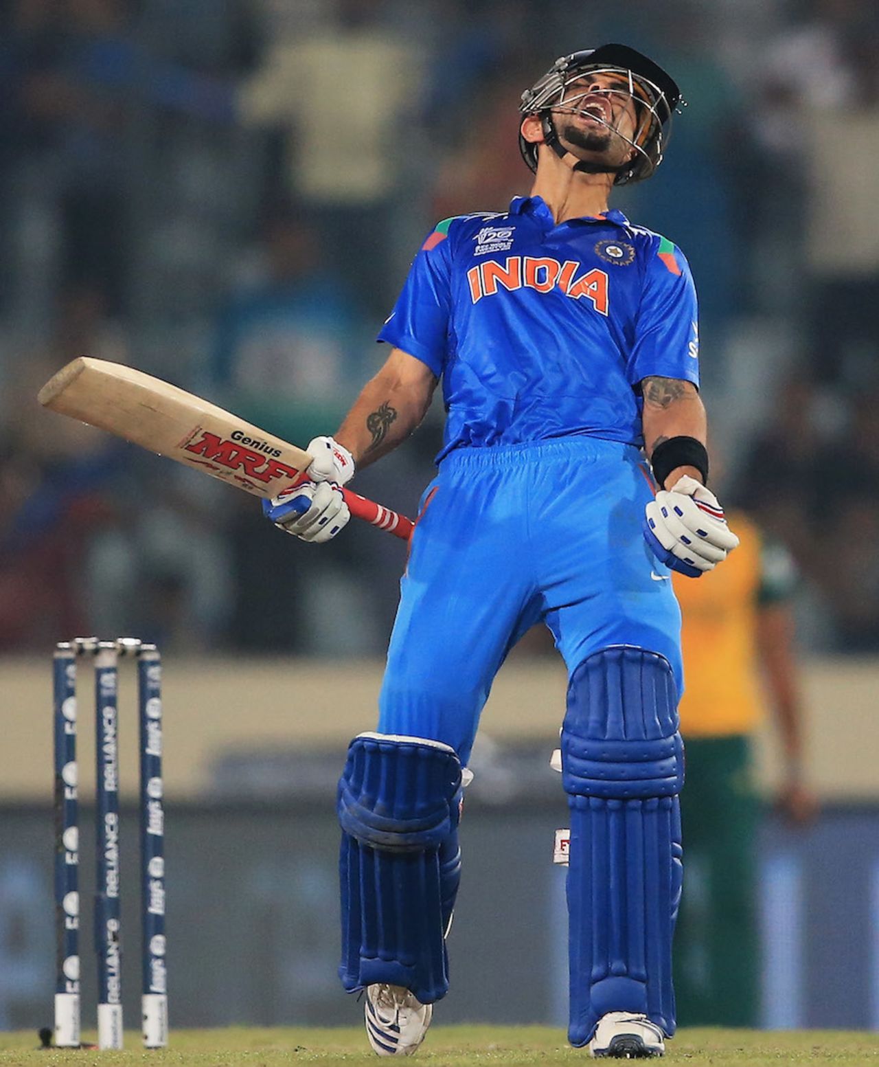 Virat Kohli lets out a cry after hitting the winning runs, India v South Africa, World T20, semi-final, Mirpur, April 4, 2014
