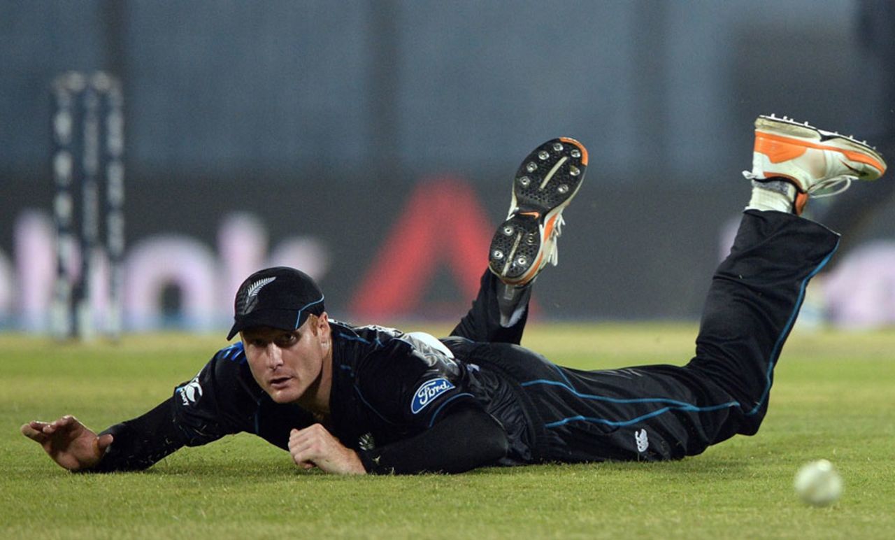 Martin Guptill unsuccessfully tries to stop the ball, England v New Zealand, World T20, Group 1, Chittagong, March 22, 2014