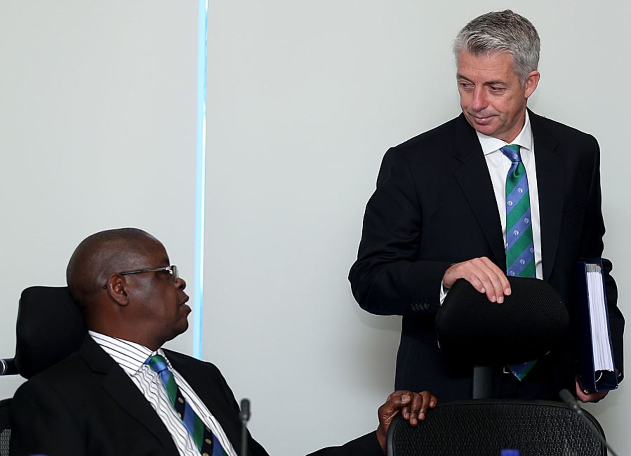 Peter Chingoka and David Richardson have a chat during the ICC Board meeting, Dubai, April 9, 2014