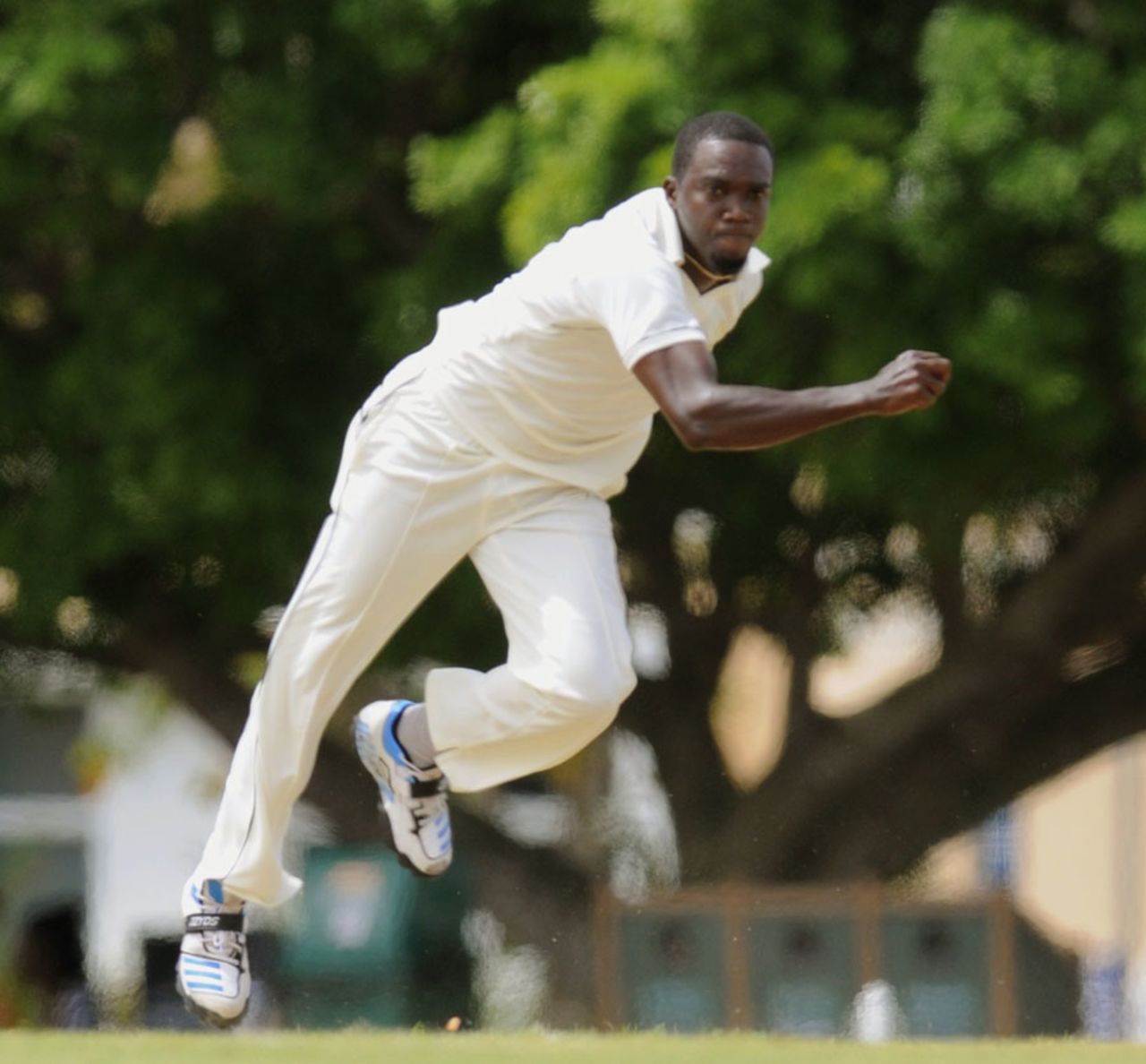 Jerome Taylor hurls in a delivery, Combined Campuses and Colleges v Jamaica, Regional Four Day Competition, Jamaica, 2nd day, April 13, 2014