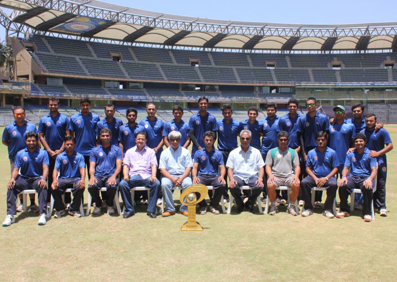 The victorious Baroda team pose with the Syed Mushtaq Ali Trophy, Baroda v UP, Syed Mushtaq Ali Trophy, final, Mumbai, April 14, 2014