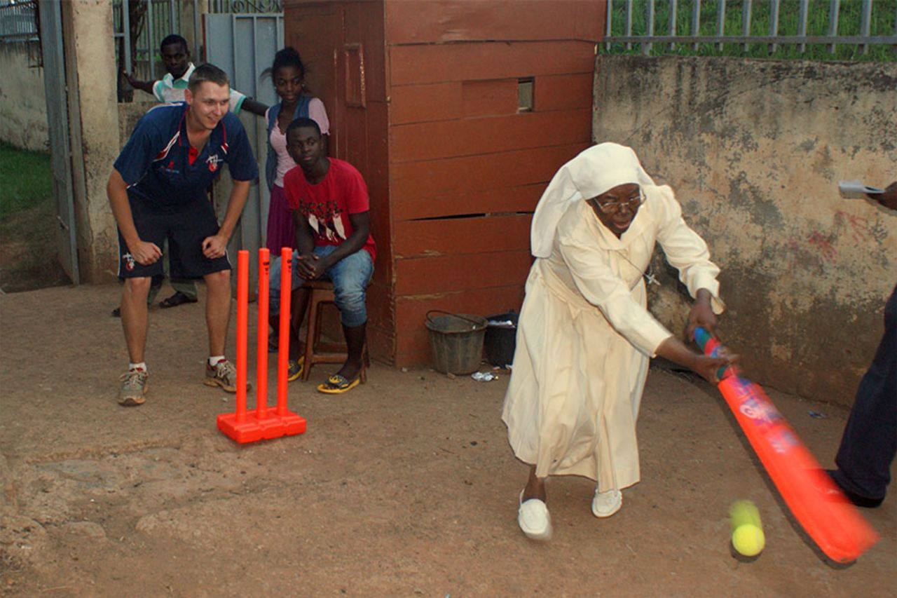 <b>Liam Burnell: </b>Inclusivity - that's the name of the game! This picture was taken at an orphanage run by the Roger Milla foundation on a recent Cricket Without Boundaries trip to Cameroon. The nun who ran the orphanage, was so interested in what was going on she wanted to have a bat herself. This is the second ball she faced, and she decided to dance down the wicket to one of our team members, much to their bemusement. Cricket Without Boundaries works in Africa to develop cricket in Rwanda, Kenya, Uganda, Botswana and Cameroon, while also helping to raise awareness of HIV/AIDS among the younger population.
This was my 2nd CWB trip, and I've loved every minute. I'm currently on my gap year before I head to the University of York to study Psychology in September. Looking forward to another summer of cricket with Steeple Langford CC in the heart of Wiltshire!
