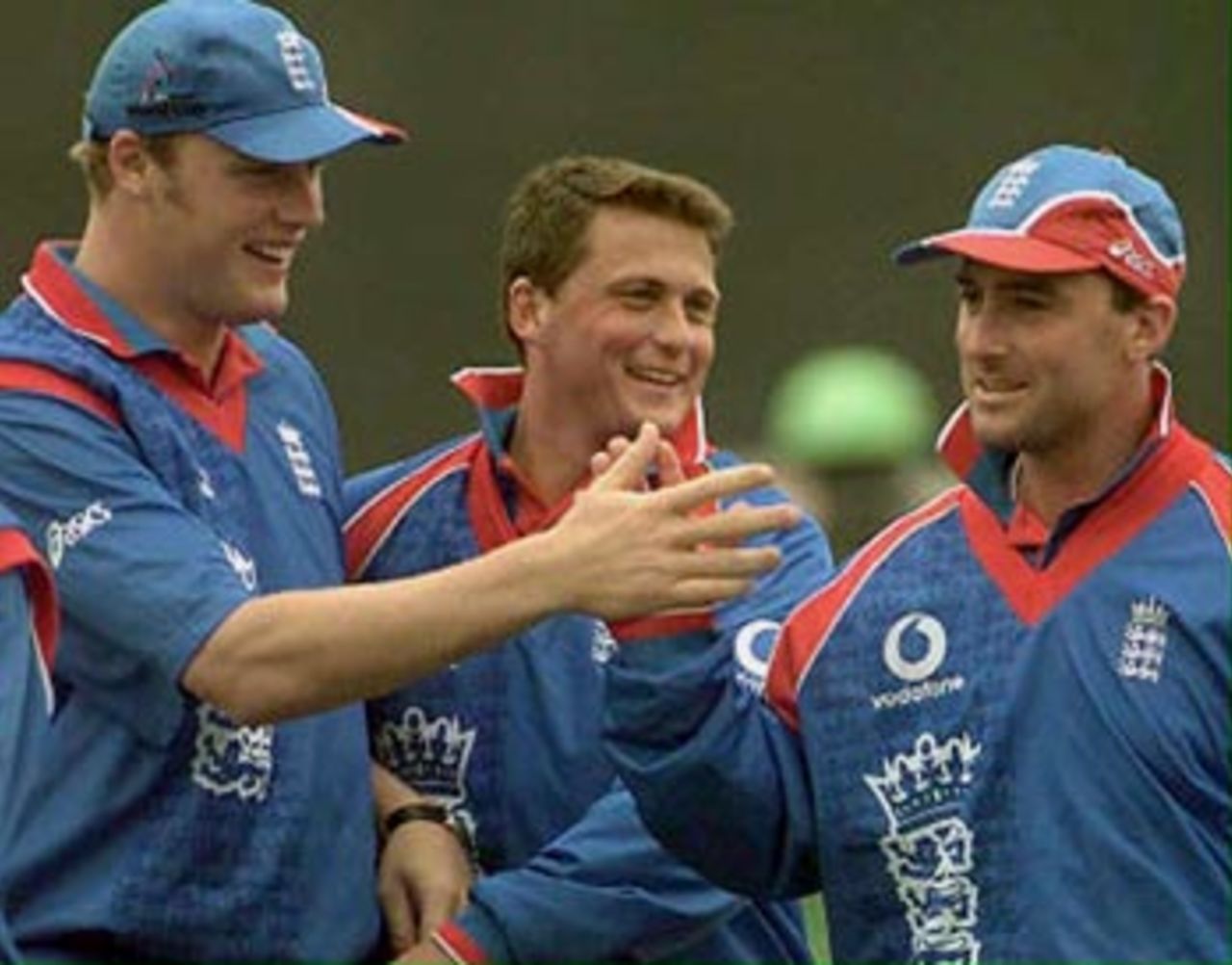 England's Darren Gough, celebrates with colleagues Andrew Flintoff, (left) and Graham Thorpe (right) after the dismissal of the Kenyans for 202, during their Cricket World Cup clash in Canterbury, 18 May 1999.
