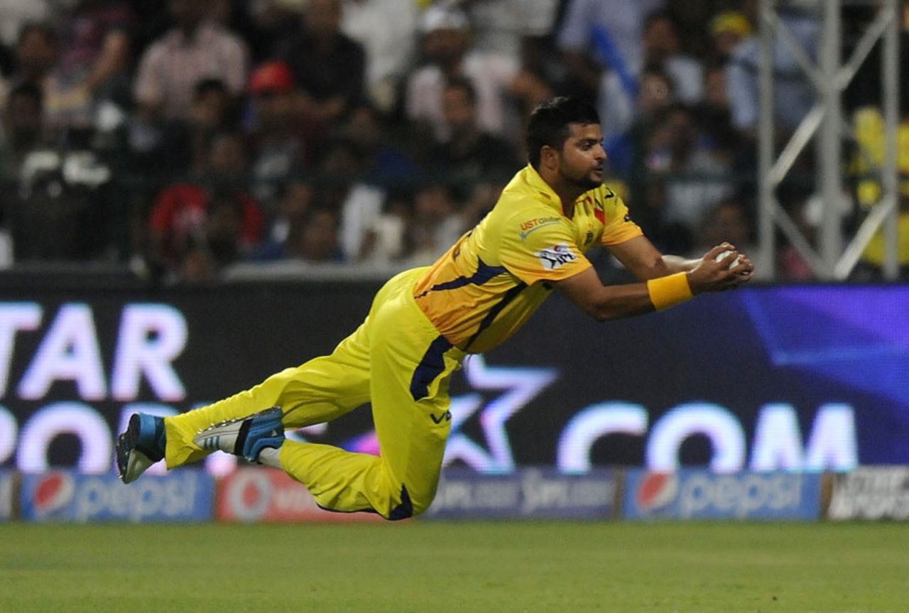 Suresh Raina dives to take a spectacular catch, Chennai Super Kings v Delhi Daredevils, IPL 2014, Abu Dhabi, April 21, 2014
