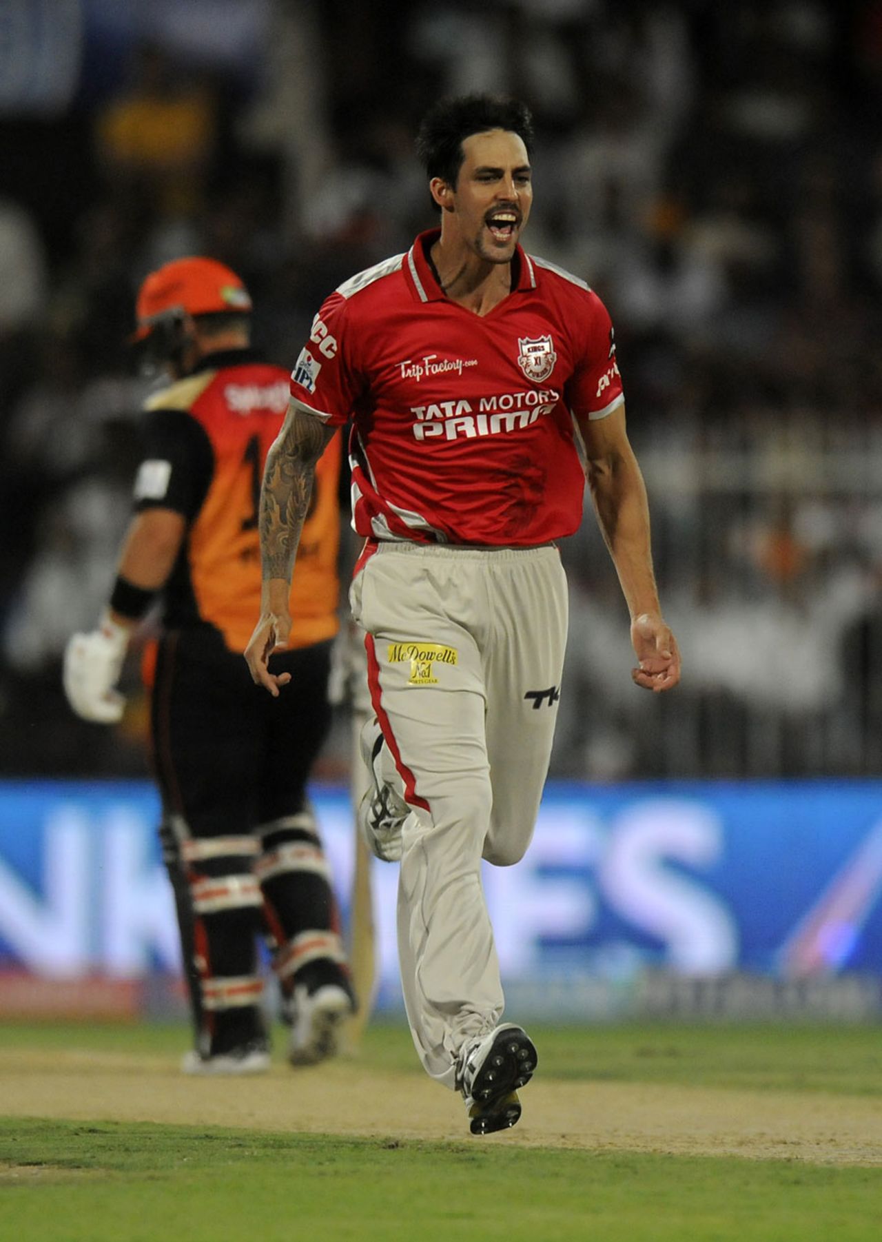 Mitchell Johnson exults after removing Shikhar Dhawan, Kings XI Punjab v Sunrisers Hyderabad, IPL 2014, Sharjah, April 22, 2014
