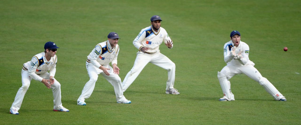 Andy Hodd takes a catch as the slip cordon looks on, Yorkshire v Northamptonshire, County Championship, Division One, Headingley, 4th day, April 23, 2014