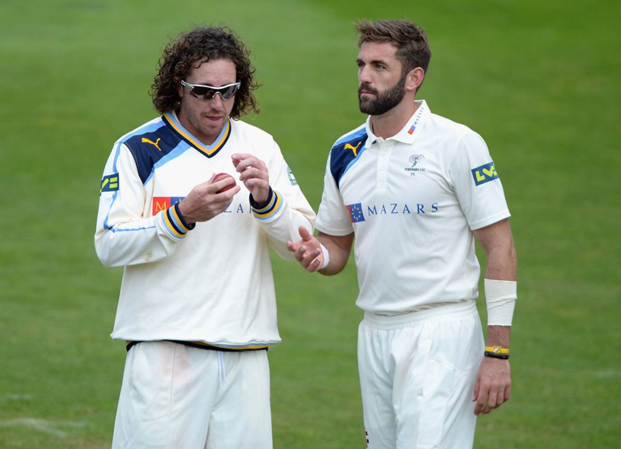 Ryan Sidebottom and Liam Plunkett inspect the ball, Yorkshire v Northamptonshire, County Championship, Division One, Headingley, 4th day, April 23, 2014