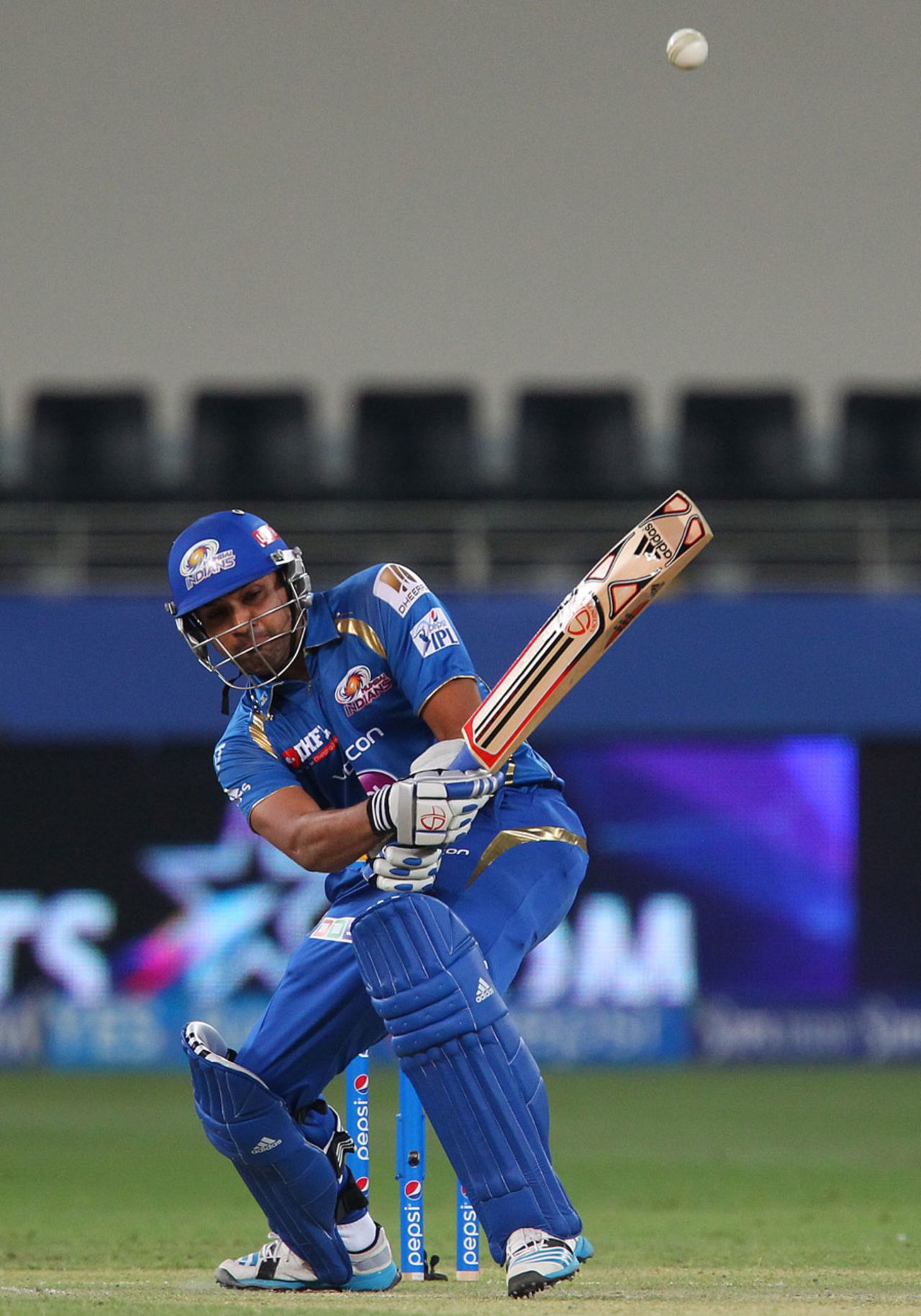 Rohit Sharma scoops the ball to the fine leg boundary, Mumbai Indians v Chennai Super Kings, IPL 2014, Dubai, April 25, 2014