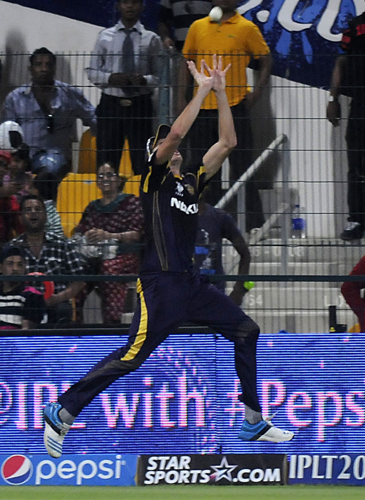 Morne Morkel jumps to take the catch of David Miller, Kolkata Knight Riders v Kings XI Punjab, IPL 2014, Abu Dhabi, April 26, 2014