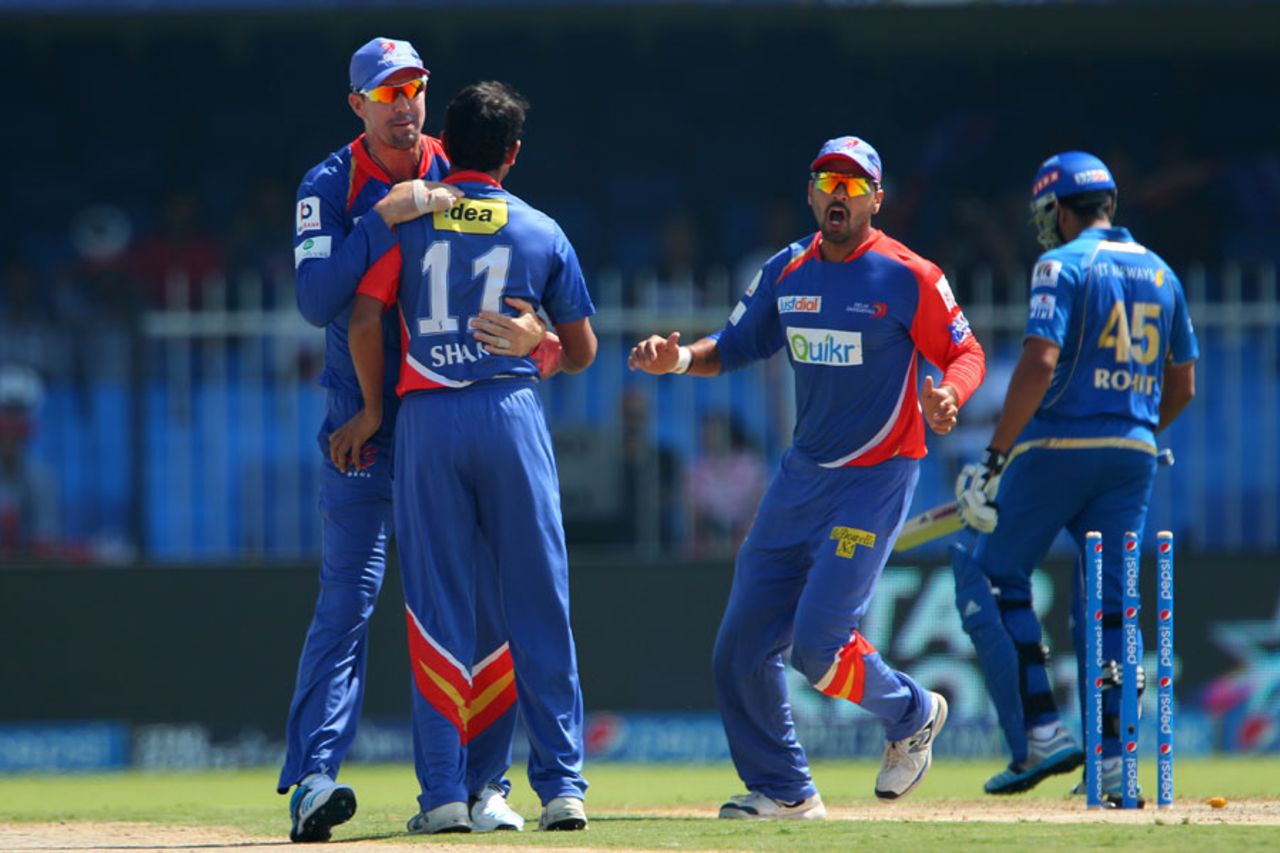 Mohammed Shami is congratulated after getting Rohit Sharma run-out, Daredevils v Mumbai Indians, IPL 2014, Sharjah, April 27, 2014