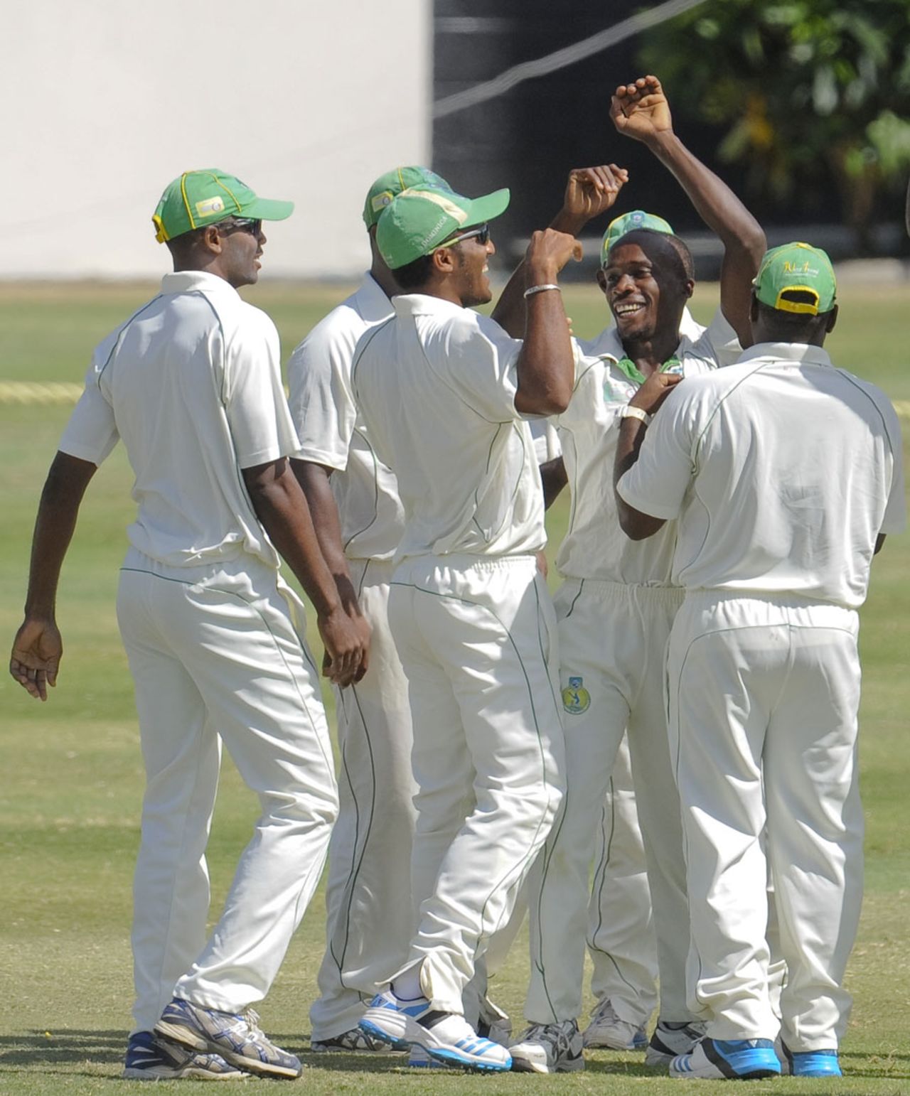 Kenroy Peters is congratulated after his hat-trick, Windward Islands v Jamaica, Regional Four Day Competition, Final, St Lucia, 3rd day, April 29, 2014