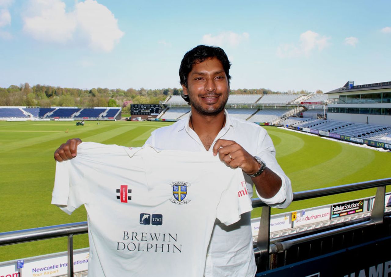 New signing Kumar Sangakkara poses with a Durham shirt, Chester-le-Street, April 29, 2014