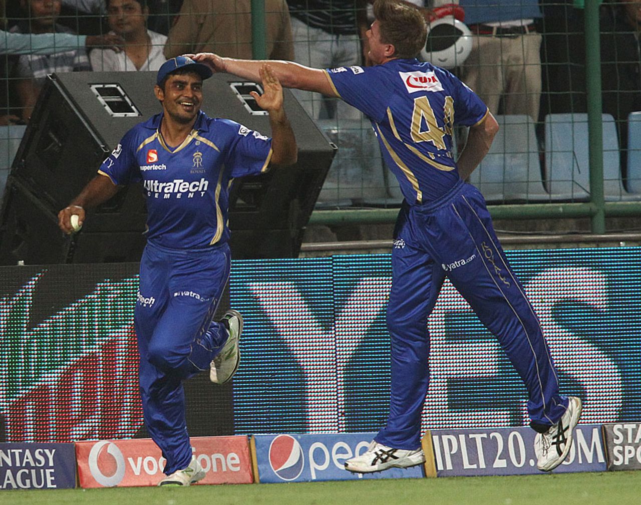 Rajat Bhatia is congratulated by James Faulkner for taking a catch at the boundary's edge, Delhi Daredevils v Rajasthan Royals, IPL, Delhi, May 3, 2014