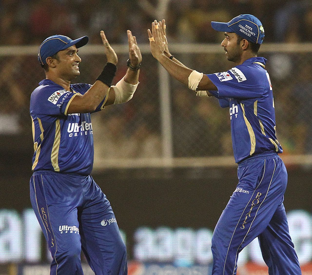 Pravin Tambe and Ajinkya Rahane celebrate the fall of Aaron Finch, Rajasthan Royals v Sunrisers Hyderabad, IPL, Ahmedabad, May 8, 2014