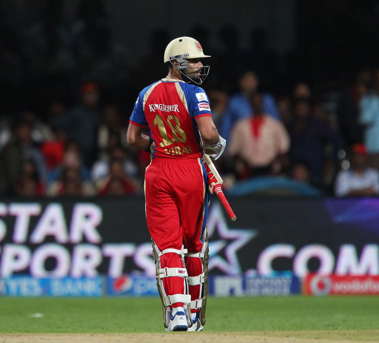 A dejected Virat Kohli walks back after falling for a first-ball duck, Royal Challengers Bangalore v Kings XI Punjab, IPL 2014, Bangalore, May 9 2014