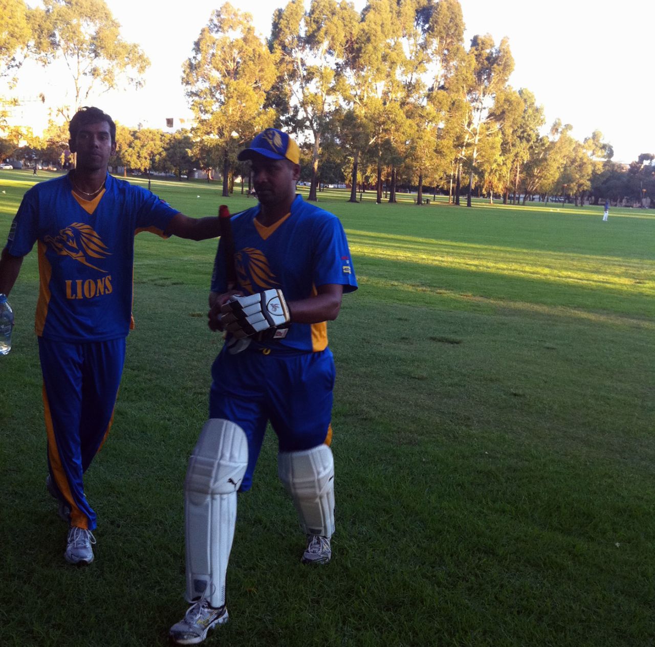 Suresh Perera walks back after scoring a century for the Sri Lankan Lions in Perth