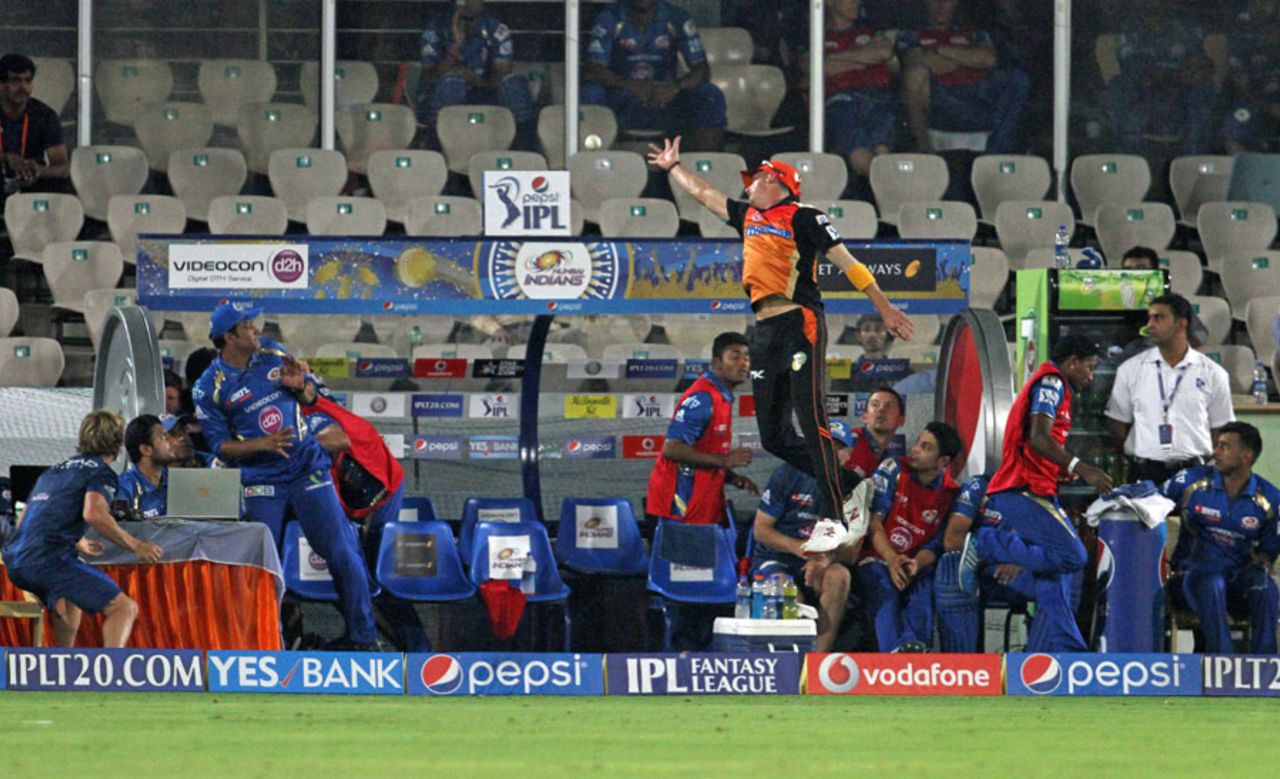 Dale Steyn nearly lands in the Mumbai Indians dugout while attempting a catch, Sunrisers Hyderabad v Mumbai Indians, IPL 2014, Hyderabad, May 12, 2014