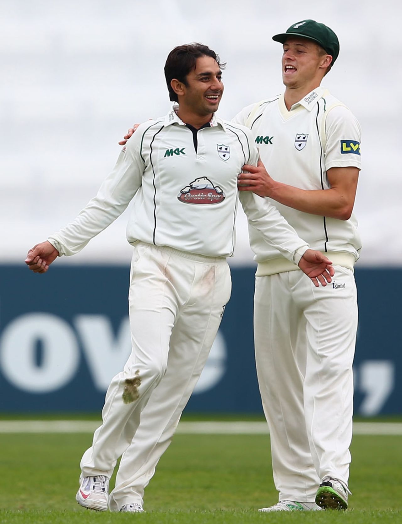 Saeed Ajmal celebrates a wicket with Alexei Kervezee, Worcestershire v Essex, County Championship, Division Two, 3rd day, May 20, 2014