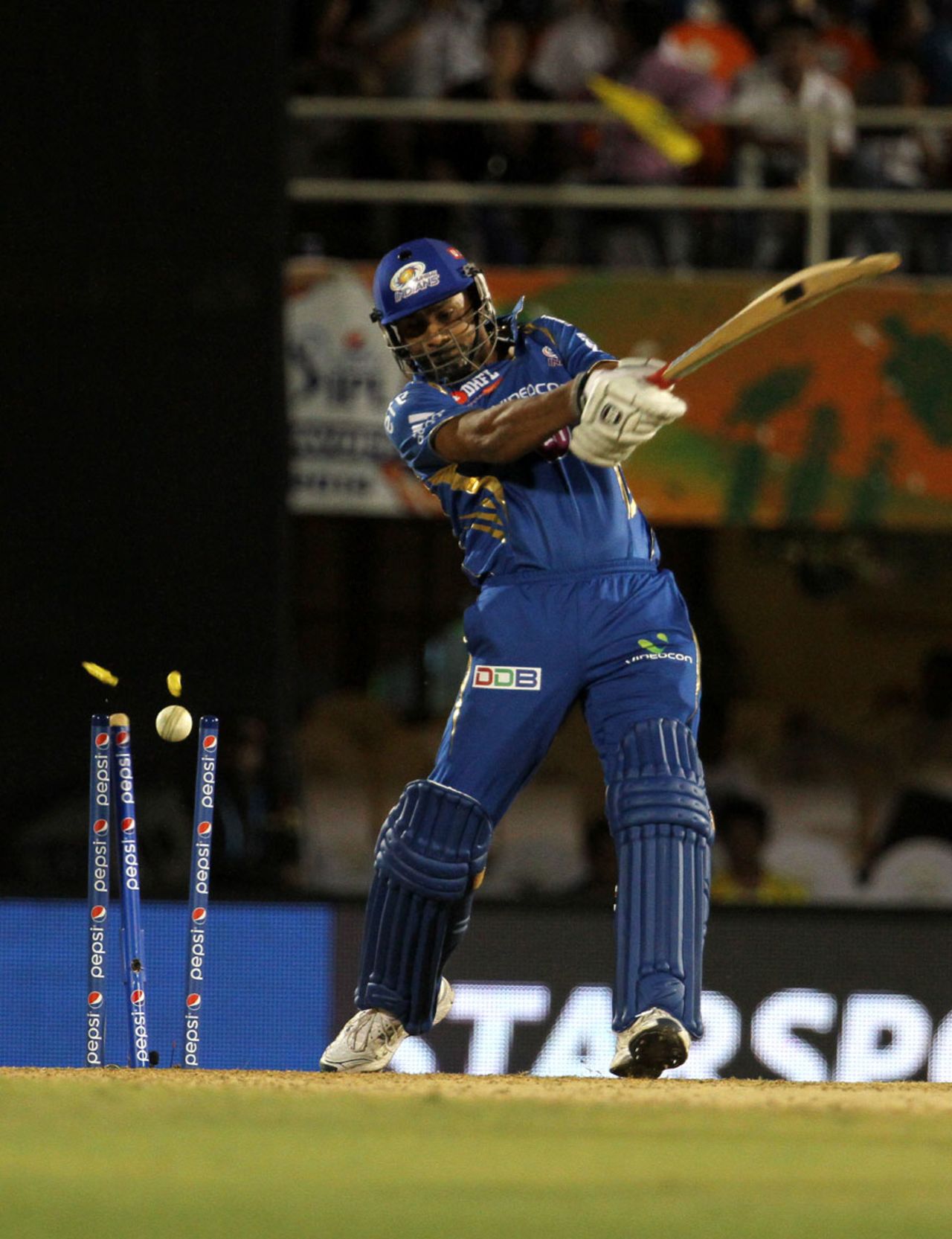 Praveen Kumar is bowled, Mumbai Indians v Chennai Super Kings, IPL 2014, Eliminator, Mumbai, May 28, 2014