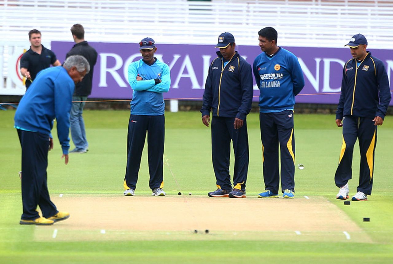 The Sri Lankans take a close look at the pitch, Lord's, May 30, 2014