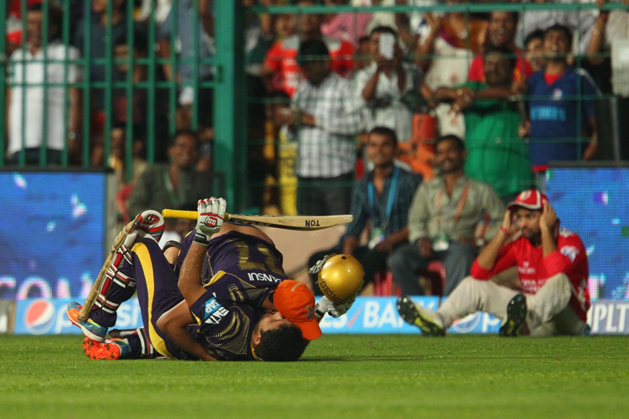 Piyush Chawla is floored by Robin Uthappa after striking the winning runs, Kolkata Knight Riders v Kings XI Punjab, IPL 2014, final, June 1, 2014