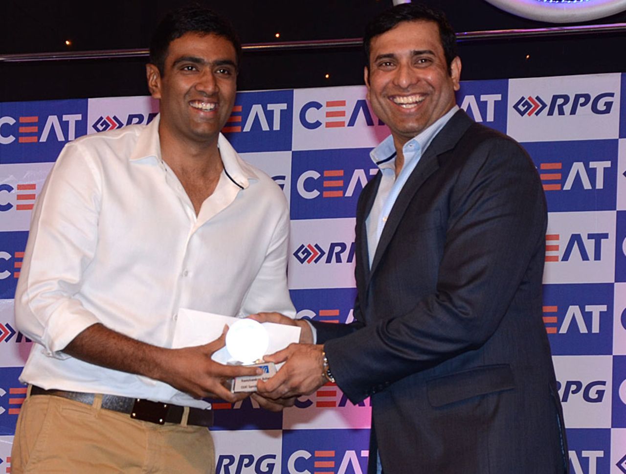 R Ashwin receives the Indian Player of the Year award from VVS Laxman at the CEAT Awards, Mumbai, June 2, 2014 