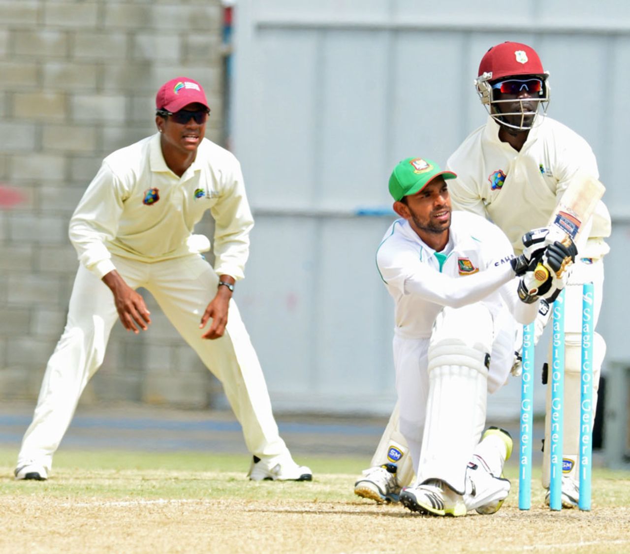Marshall Ayub plays a sweep during his innings of 41, Sagicor HPC v Bangladesh A, Barbados, 2nd day, June 3, 2014