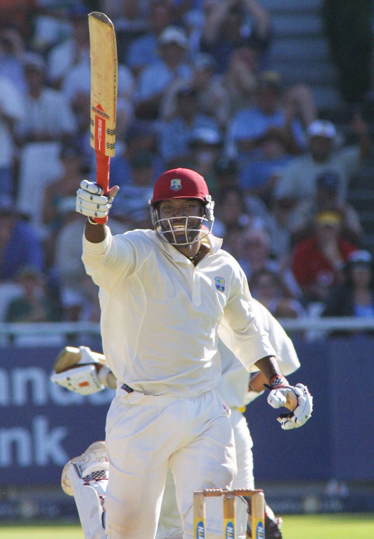 Chris Gayle exults after slamming a hundred off 79 balls, South Africa v West Indies, 3rd Test, 2nd day, Cape Town, January 3, 2004