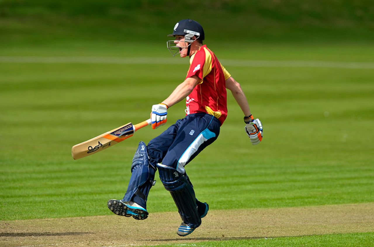 Michael Leask exults upon reaching his century, Reivers v Highlanders, North Sea Pro T20 Series, Dumfries, June 2, 2014