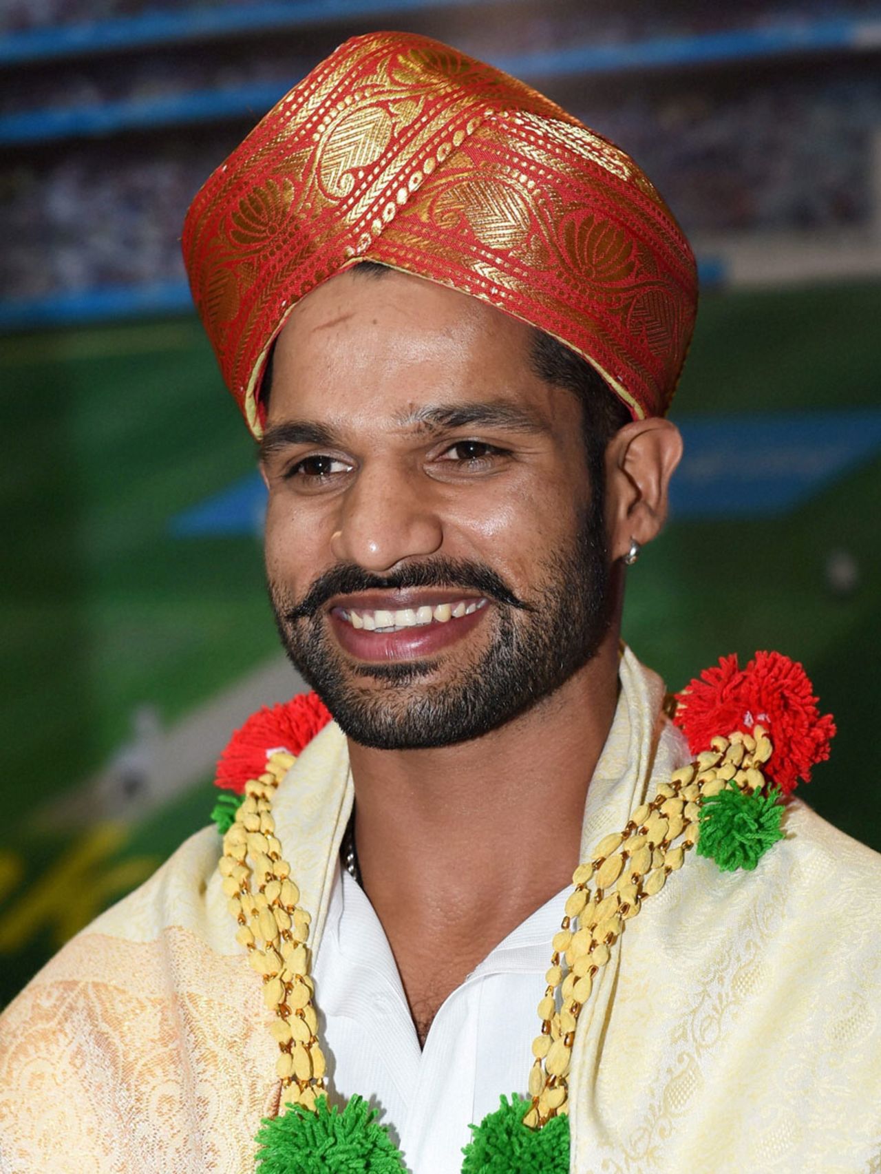 Shikhar Dhawan wears a traditional Mysore <i>peta</i> (turban), Bangalore, June 4, 2014