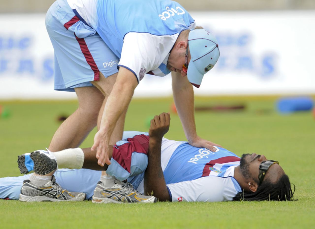 Chris Gayle stretches during a training session, Kingston, June 8, 2014