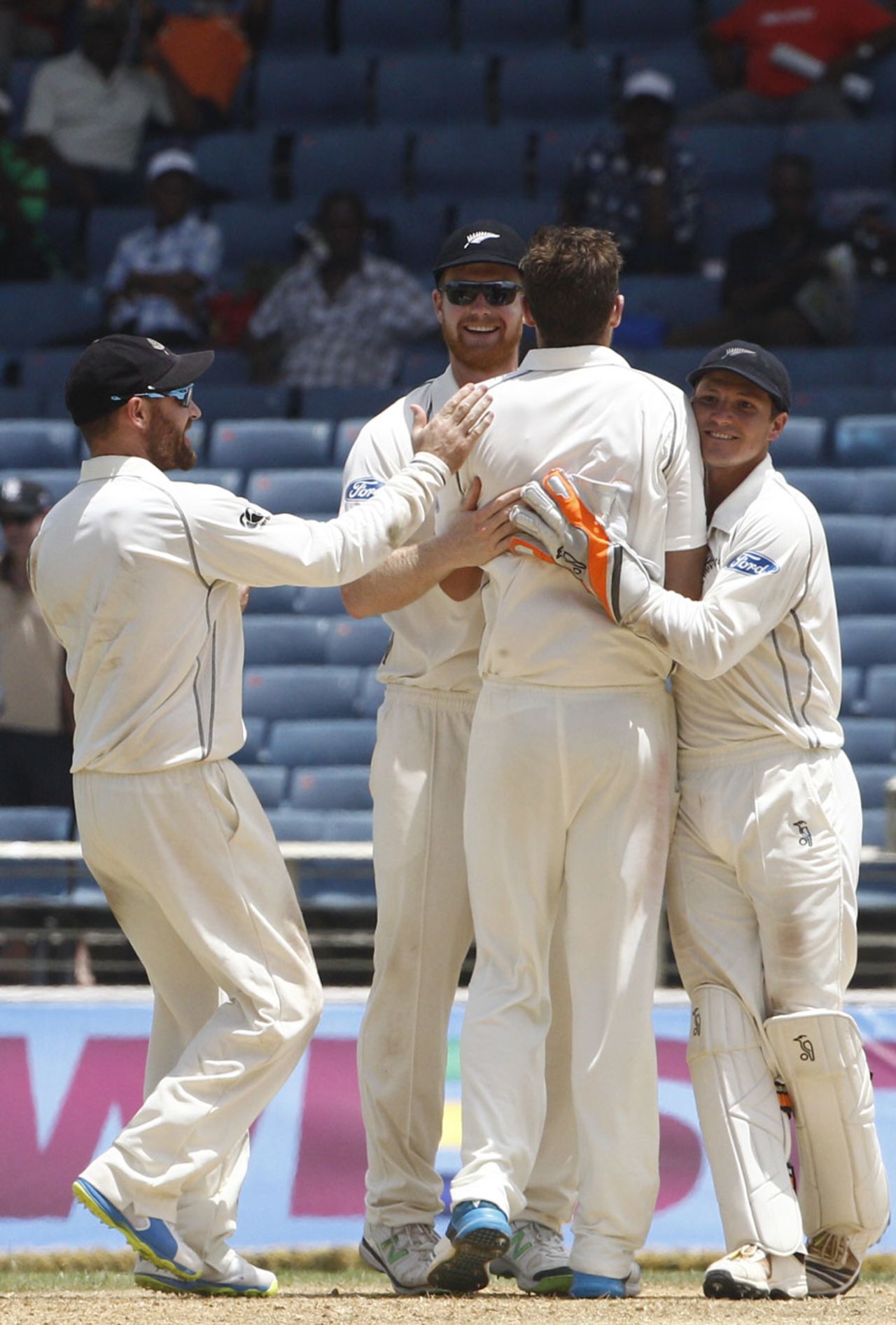 Tim Southee is congratulated after removing Chris Gayle, West Indies v New Zealand, 1st Test, Kingston, 3rd day, June 10, 2014