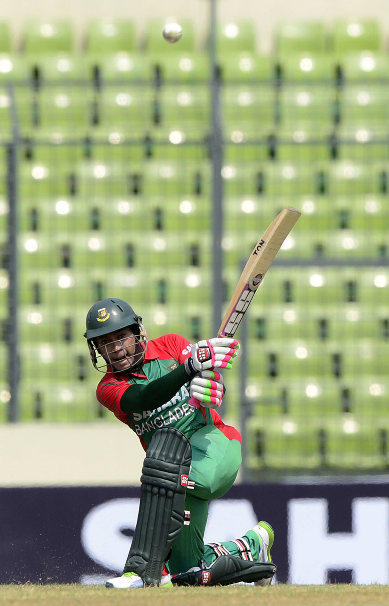 Mushfiqur Rahim plays a slog-sweep, Bangladesh v India, 1st ODI, Mirpur, June 15, 2014