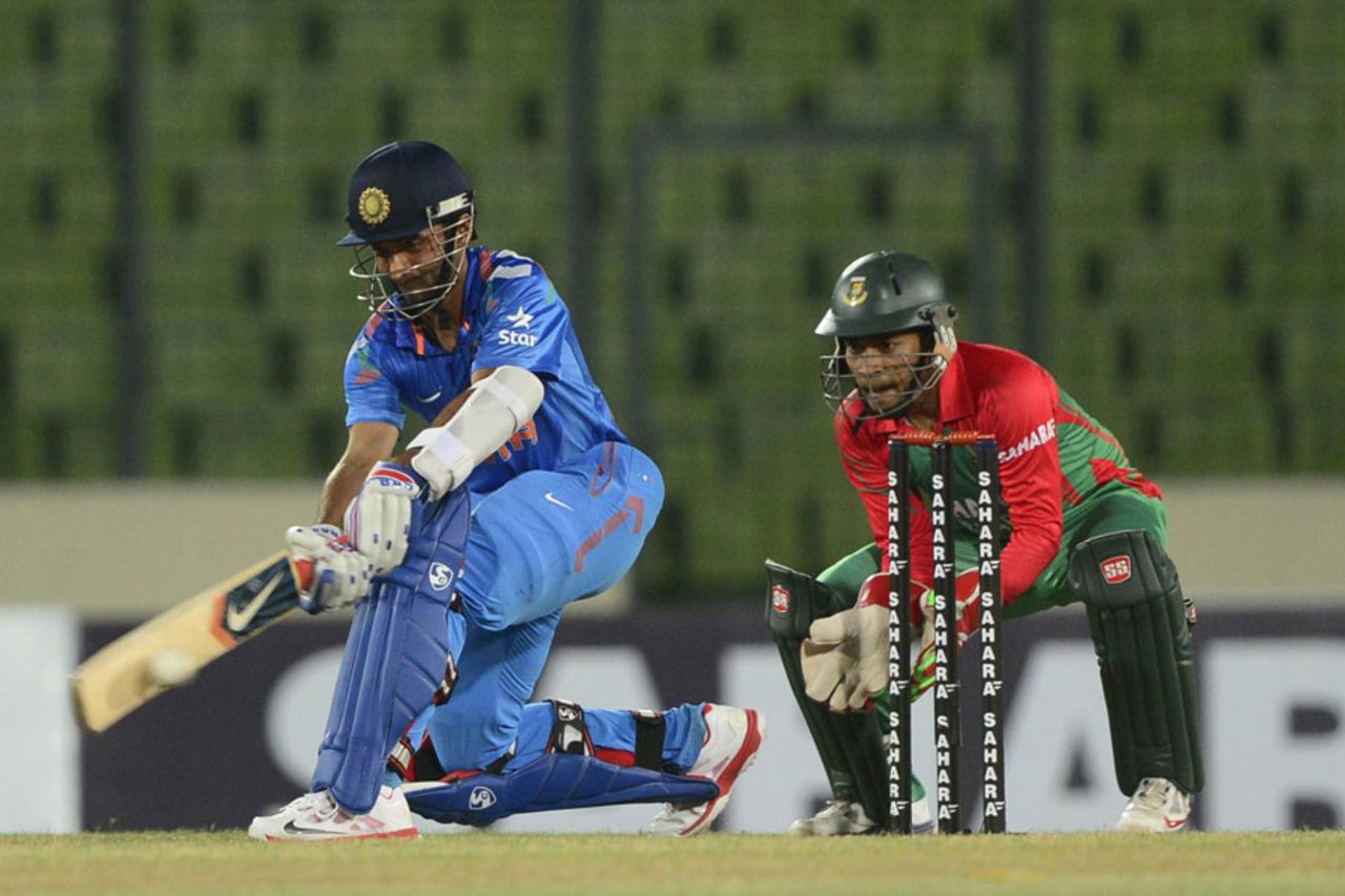 Ajinkya Rahane sweeps during his 64, Bangladesh v India, 1st ODI, Mirpur, June 15, 2014