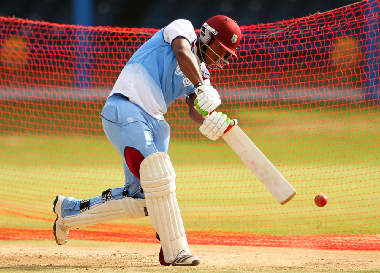 Leon Johnson hits out at a training session, Port-of-Spain, June 14, 2014