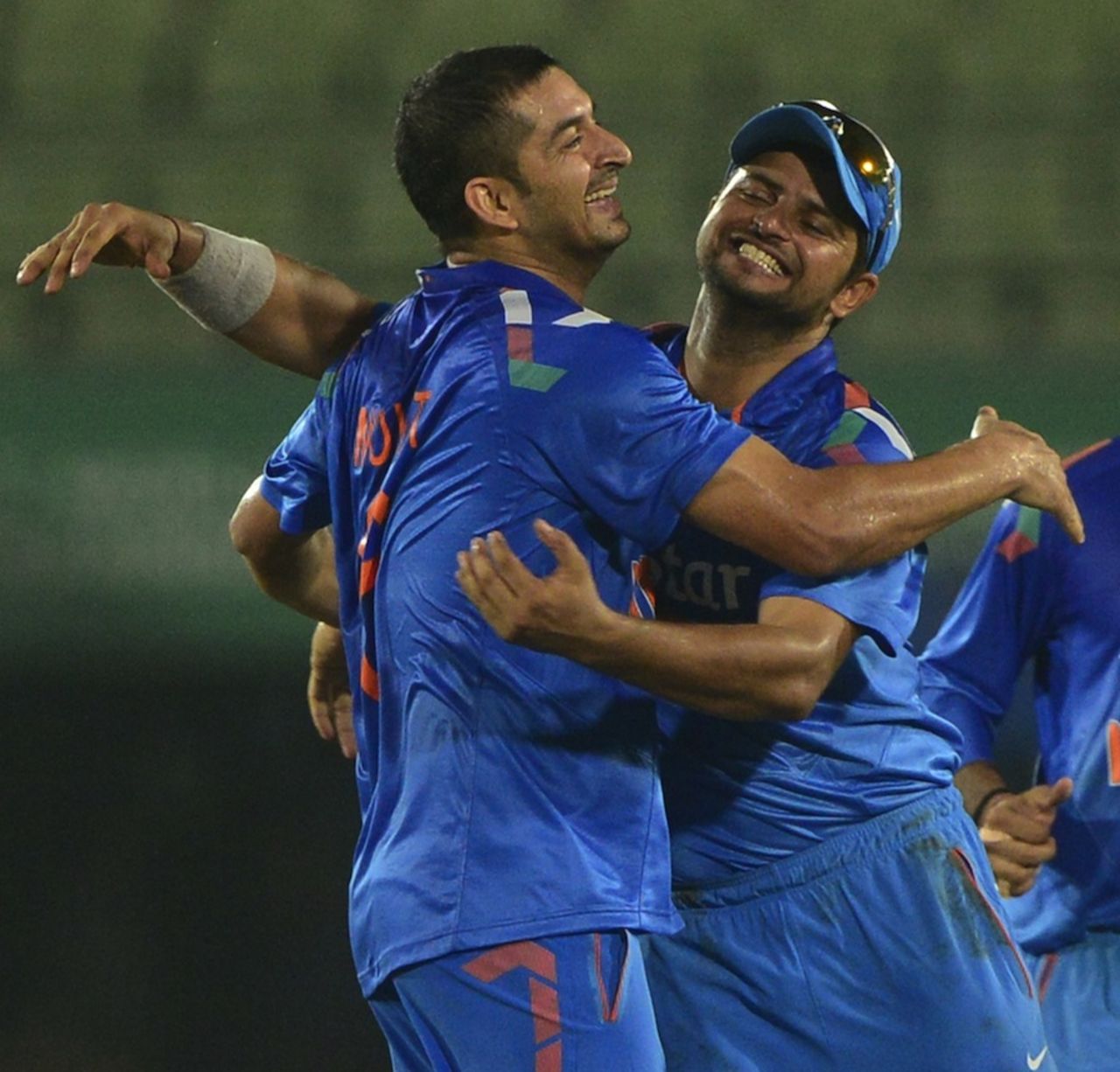Suresh Raina hugs Mohit Sharma, Bangladesh v India, 2nd ODI, Mirpur, June 17, 2014