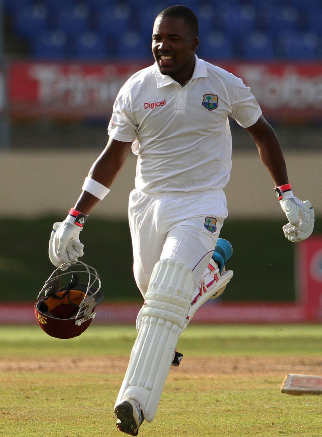 Darren Bravo takes off after reaching his first hundred on his home ground, West Indies v New Zealand, 2nd Test, Trinidad, 2nd day, June 17, 2014